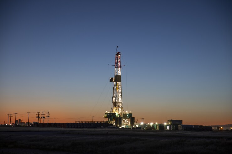 Oil Rig At Sunset