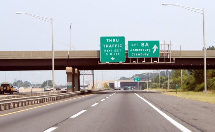 Signs and roadway on New Jersey Turnpike