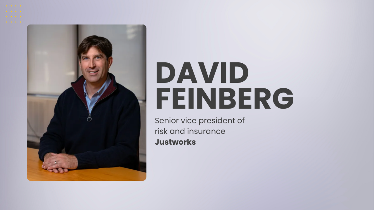 A man sitting at a desk.