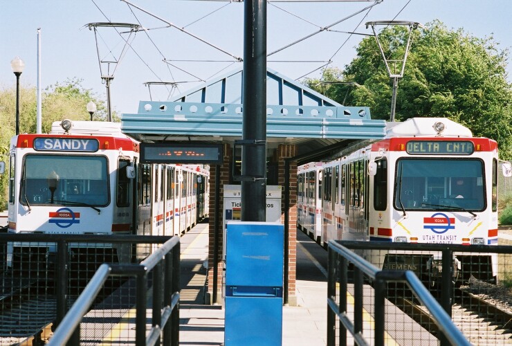 Utah Transit Authority light rail trains in a station.