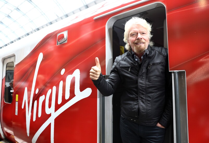 Richard Branson, Virgin Group founder and British billionaire, poses on a new high speed train in London in 2016.