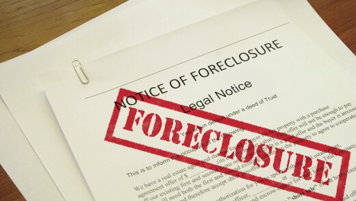 mortgage foreclosure document with red stamped text