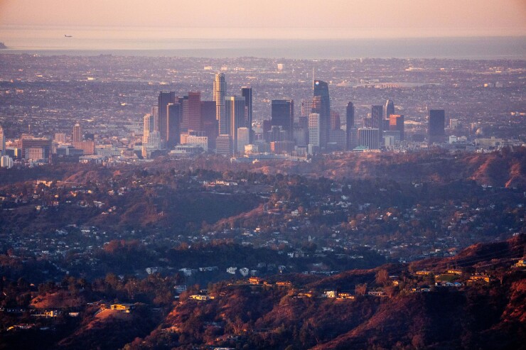 A layer of smoke blankets downtown Los Angeles