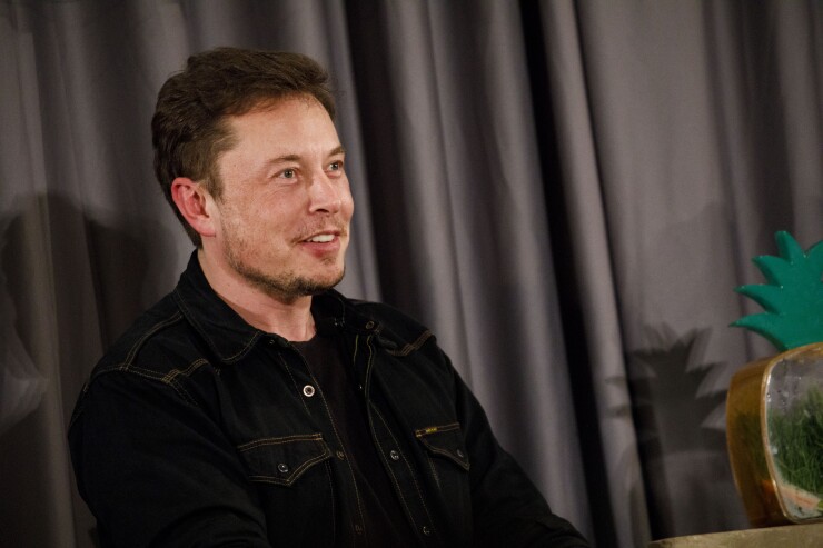 Elon Musk, co-founder and chief executive officer of Tesla Inc., speaks during a Boring Co. event in Los Angeles, California, U.S., on Thursday, May 17, 2018.