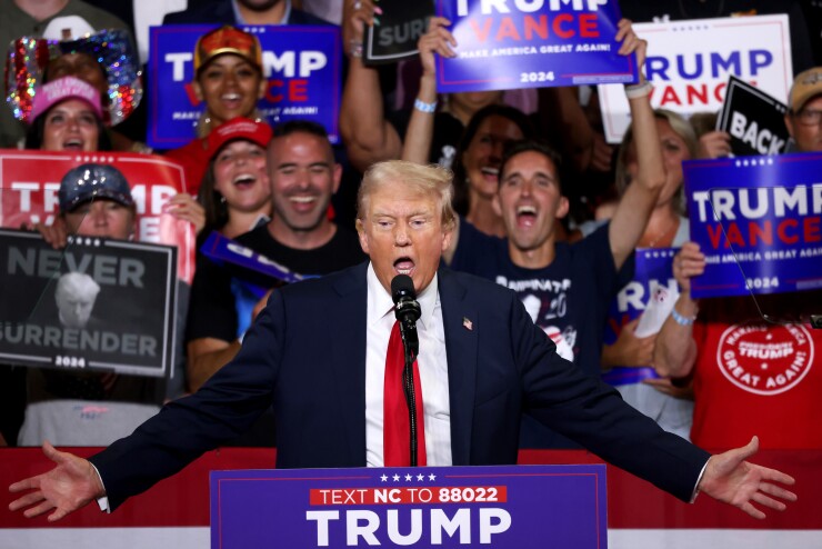 Donald Trump speaking at a rally