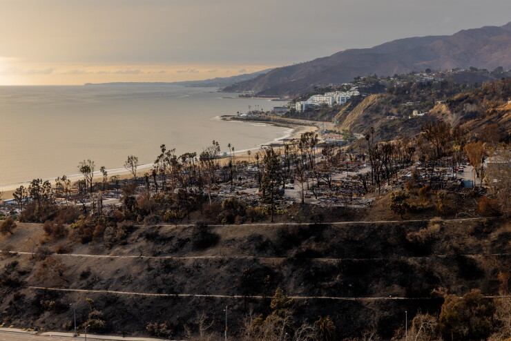 Ravaged homes by the Palisades Fire in the Pacific Palisades area of Los Angeles.