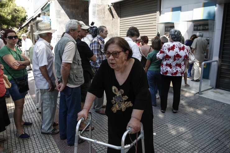 elderly woman with walker.jpg