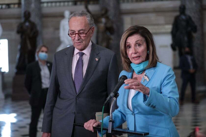 Nancy Pelosi, right, with Chuck Schumer, following a meeting at the U.S. Capitol in Washington, D.C., on Aug. 5.
