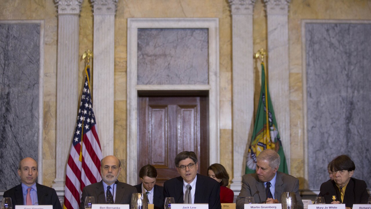 Former Treasury Secretary Jack Lew chairs a meeting of the Financial Stability Oversight Council.