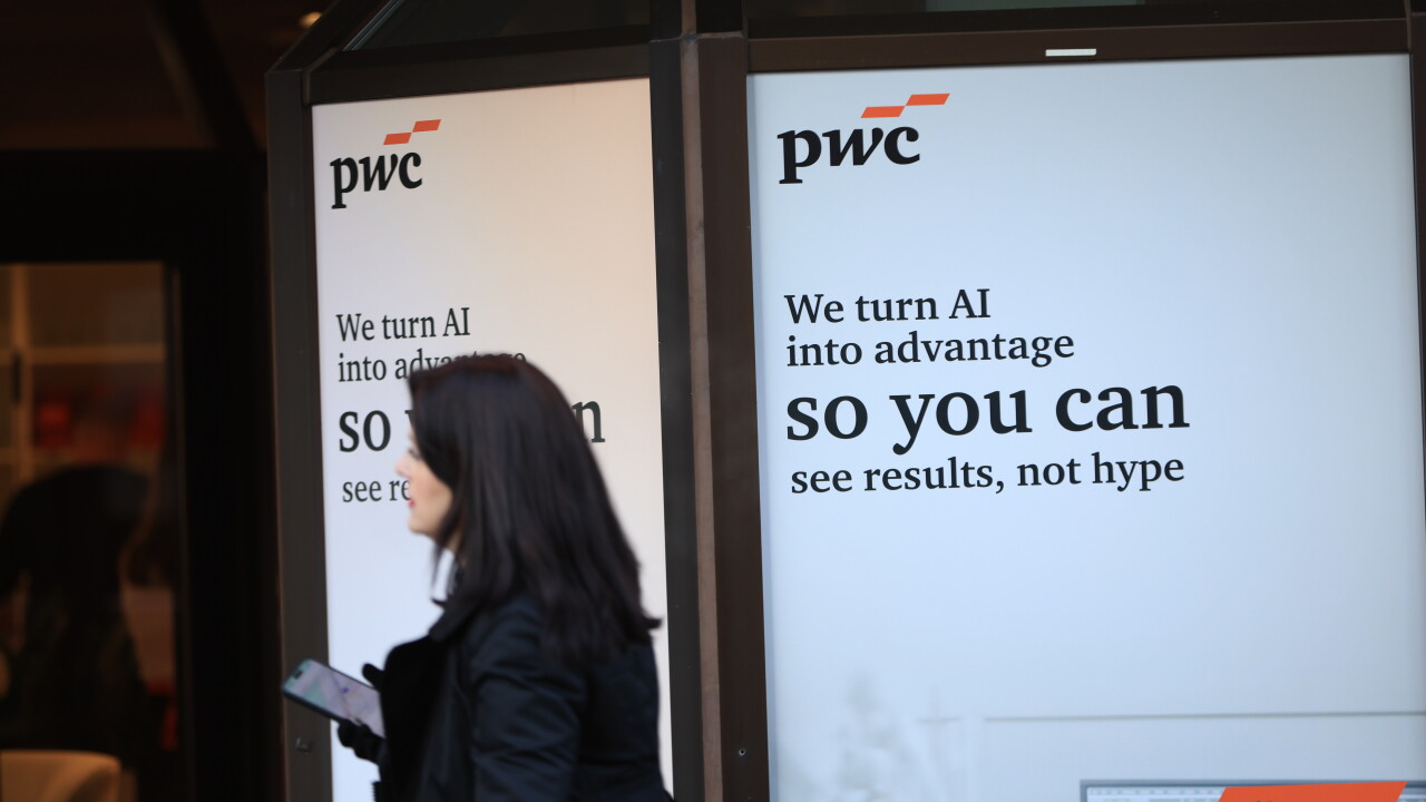 A PricewaterhouseCoopers sign in Davos