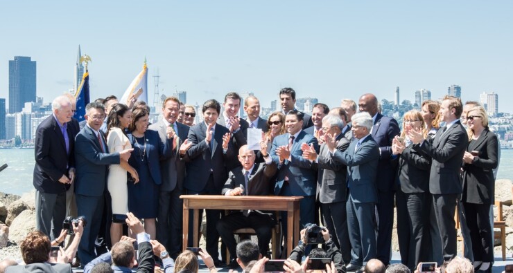 Brown-Jerry-Climate Change signing-7-25-17