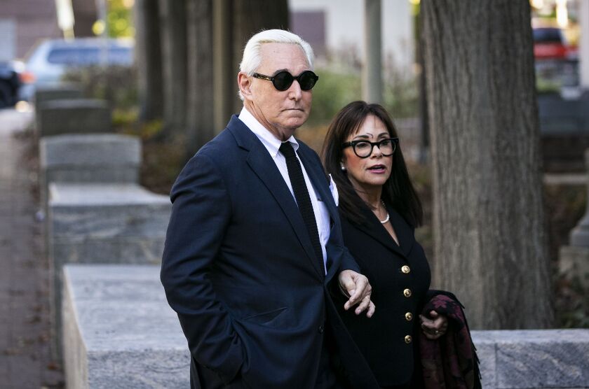 Roger Stone, former adviser to Donald Trump's presidential campaign, and his wife Nydia Stone arrive at federal court in Washington, D.C.