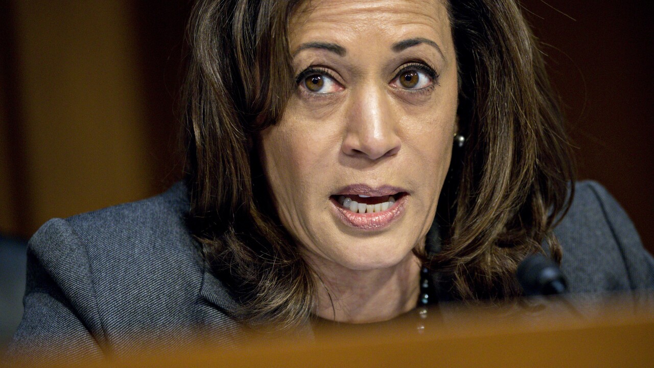 Sen. Kamala Harris, D-Calif., questions witnesses during a Senate Intelligence Committee hearing on social media influence.