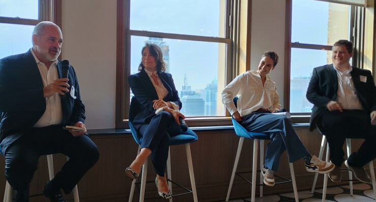 Steve Weinstein, Joanna Syroka, Catherine Ansell and Cameron Recurrel in panel discussion