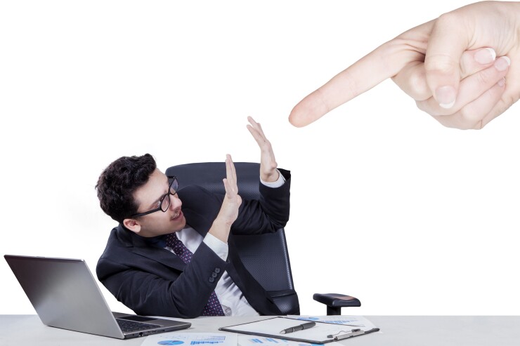 4-finger-pointing-businessman-76674581-adobe.jpg