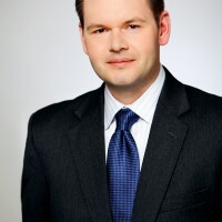 Tom Super_Executive Photo.jpg