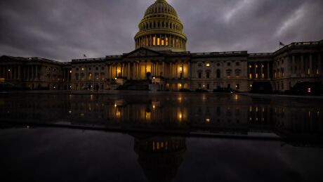 WASHINGTON, DC - DECEMBER 20: Dusk falls over the US Capitol building on December 20, 2020 in Washington, DC. Republicans and Democrats in the Senate finally came to an agreement on the coronavirus relief bill and a vote is expected later today or tomorrow. (Photo by Samuel Corum/Getty Images) Photographer: Samuel Corum/Getty Images North America
