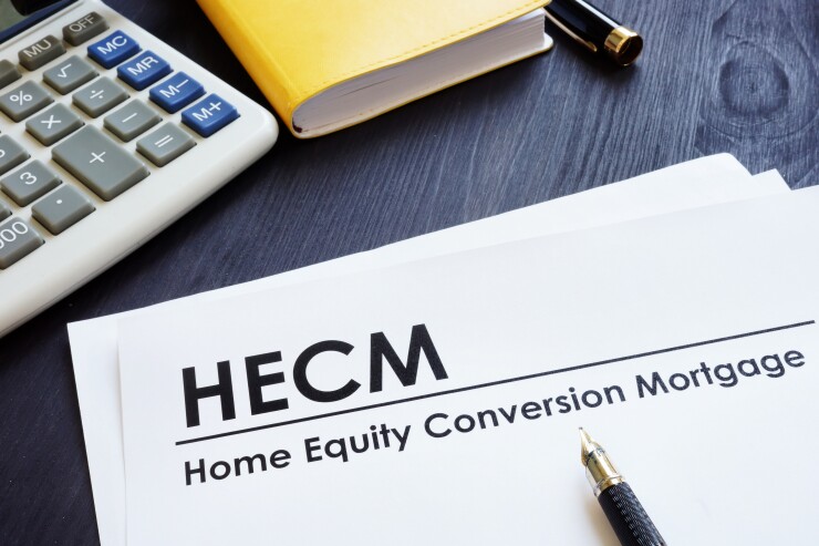 Home Equity Conversion Mortgage HECM on a desk.