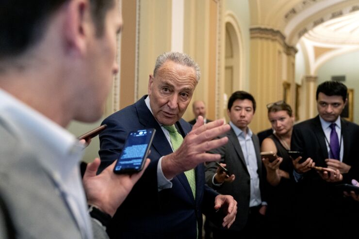 schumer-chuck-senate-reporters.jpg