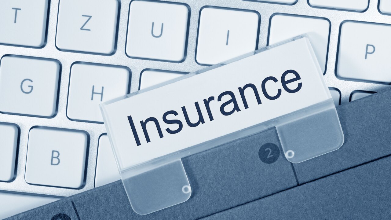 Folder with "insurance" tab.