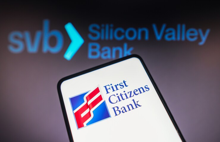 March 20, 2023, Brazil. In this photo illustration the First Citizens Bank logo seen displayed on a smartphone and Silicon Valley Bank (SVB) logo on the background.