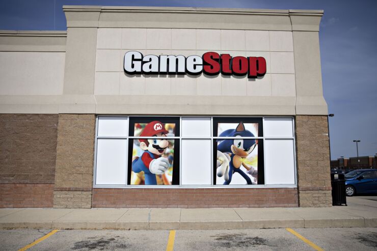 Signage is displayed at a GameStop Corp. store in Oswego, Illinois, U.S., on Monday, April 1, 2019. GameStop is scheduled to release earnings figures on April 2. Photographer: Daniel Acker/Bloomberg