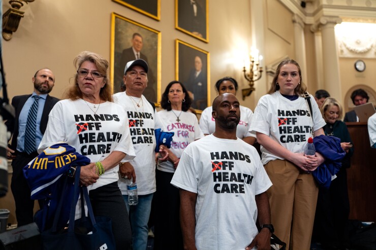 Demonstrators during a markup of President Donald Trump's tax package in Washington, D.C.
