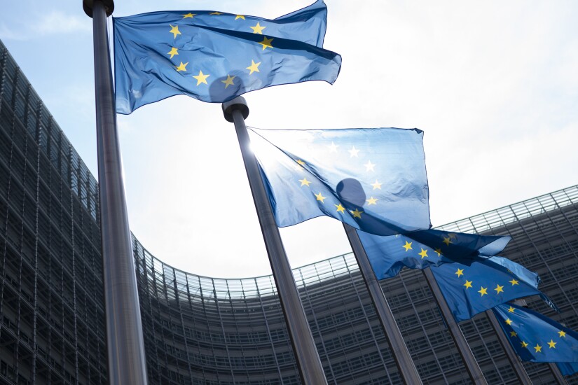 European Union flags fly outside the Berlaymont building in Brussels.