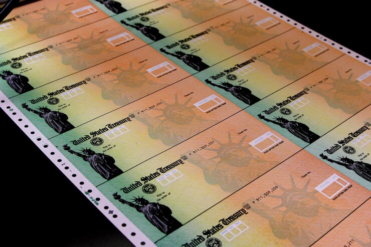 Social Security checks by Bloomberg News