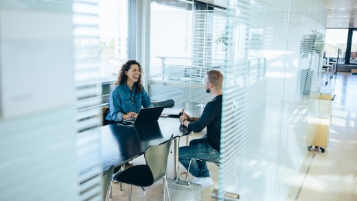 Job interview in office boardroom.