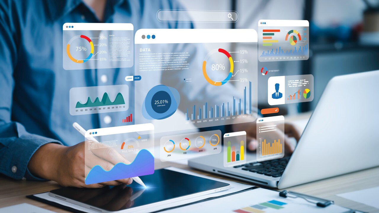Several infographics and charts superimposed over a person using a tablet and a laptop.