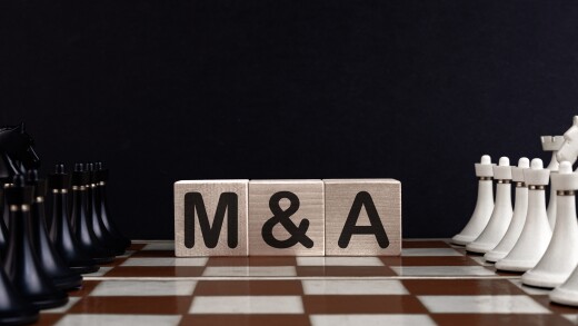Chessboard With Wooden Blocks Showing Mergers And Acquisitions Concept