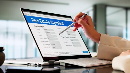 Female Appraiser Evaluating House