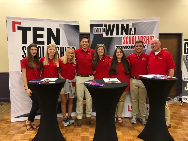 Listerhill Credit Union's millennial "financial gurus" pose together following a 2019 fundraising event. The Alabama-based CU focuses on millennial hiring efforts as a way to broaden its employee base and bring in a new demographic of employees.
