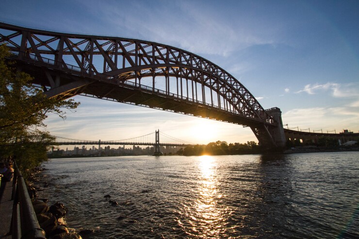 Hell Gate Bridge in New York City, which carries Amtrak trains from Boston and New Haven to Penn Station.