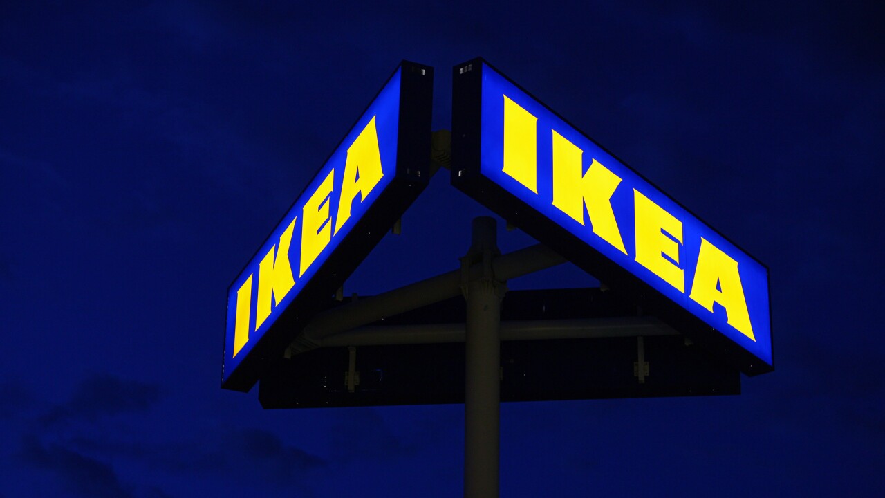 An Ikea Group sign is illuminated before the grand opening of the company's new store in Centennial, Colorado.