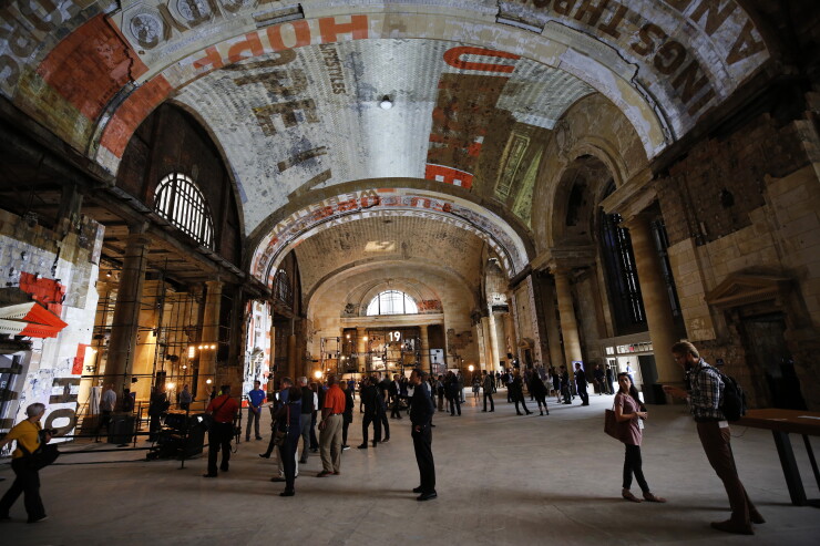 Attendees view the interior of the Michigan Central Station during a Ford Motor Co. event in the Corktown neighborhood of Detroit, Michigan, U.S., on Tuesday, June 19, 2018.