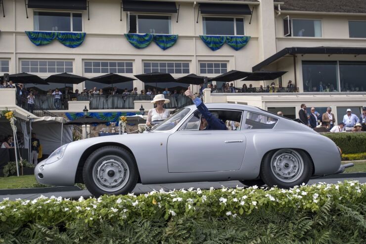 A 1960 Porsche Carrera Abarth GTL Viarenzo and Filliponi Coupe is driven onto the winners ramp during the 2019 Pebble Beach Concours d'Elegance in Pebble Beach, California, U.S., on Sunday, Aug. 18, 2019. More the 20,000 attendees gather for the annual car event that spreads out over a weeks time. More than 20,000 car enthusiasts gathered for the Pebble Beach Concours D'Elegance, where total auction sales are expected to bring in $378 million this year. Photographer: David Paul Morris/Bloomberg