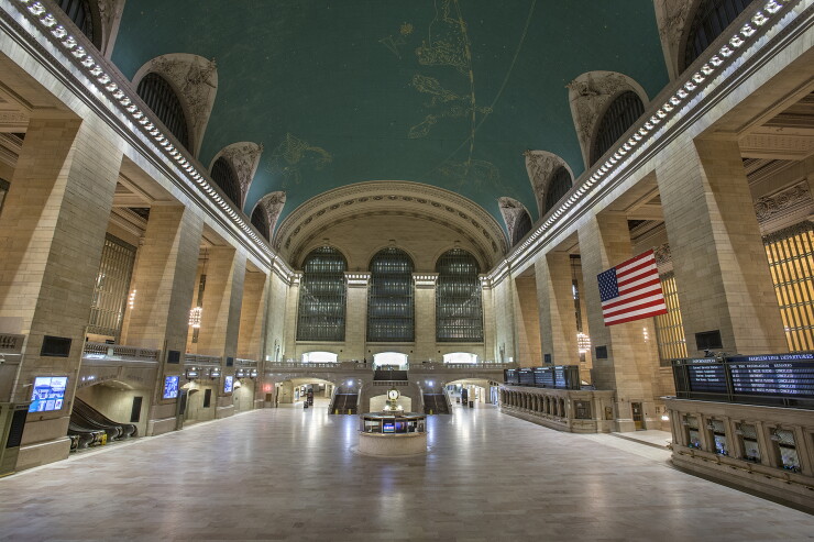 Departure signs and an empty concourse at Grand Central Terminal following a shut down of Metro-North Railroad service as per Governor Cuomo's travel ban due to Winter Storm Juno on January 27, 2015.