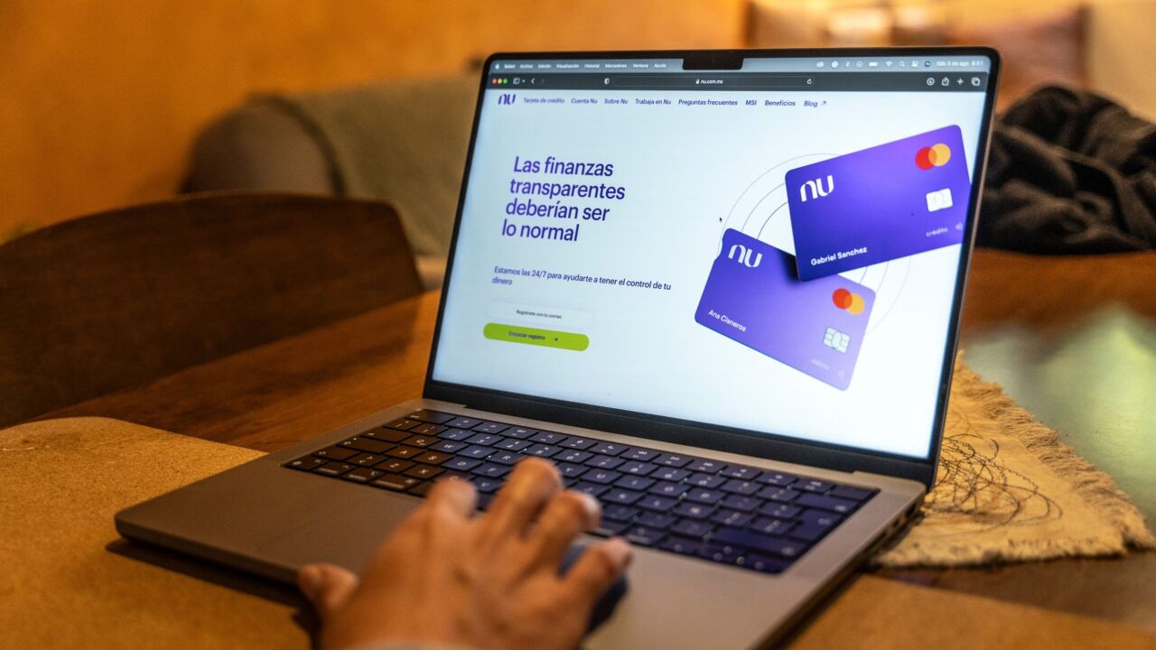 The Nubank mobile app on a laptop arranged in Mexico City, Mexico, on Saturday, Aug. 5, 2023. Nu Holdings Ltd., the Brazilian digital bank that counts Warren Buffett's Berkshire Hathaway Inc. among its biggest stockholders, is betting big that its high-yield savings accounts will stoke growth in Latin America's second-largest economy. Photographer: Alejandro Cegarra/Bloomberg
