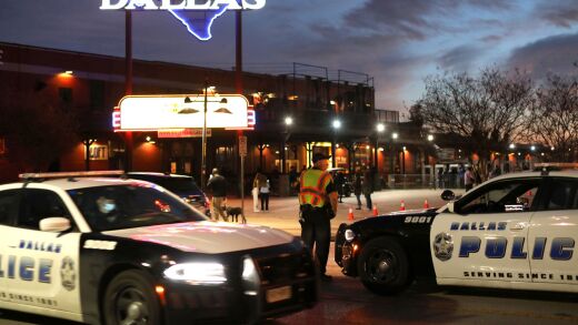 Dallas police officers and police cars