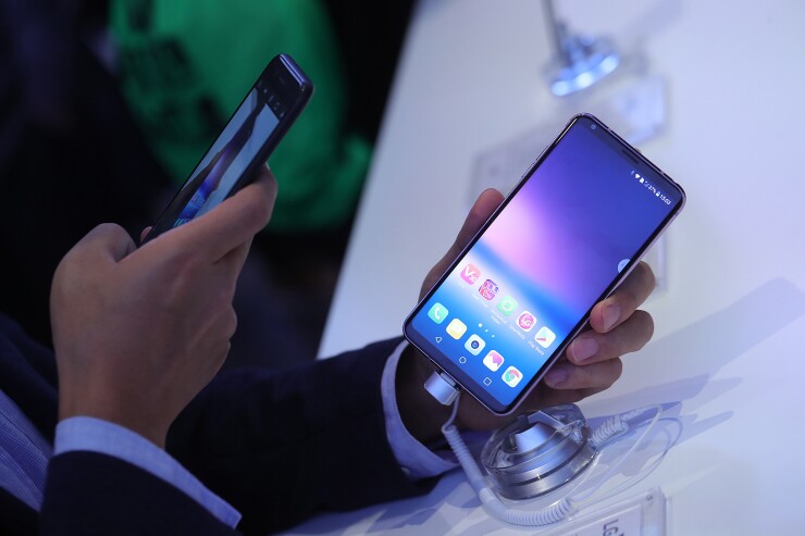 A photo of two smart phones