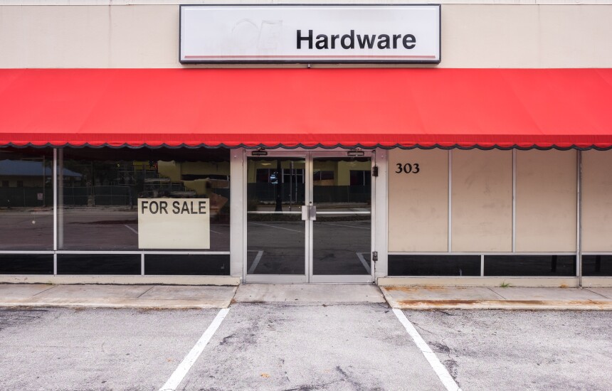 For Sale sign on hardware store - business