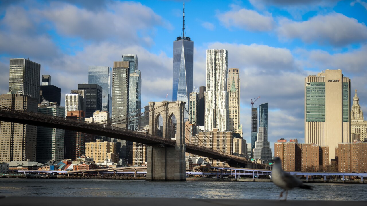 New York skyline with the Brooklyn Bridge.