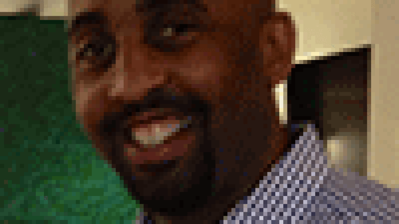 kharryscott100x133.gif