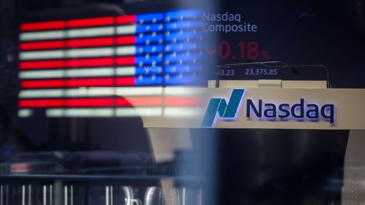 A sign that reads Nasdaq
