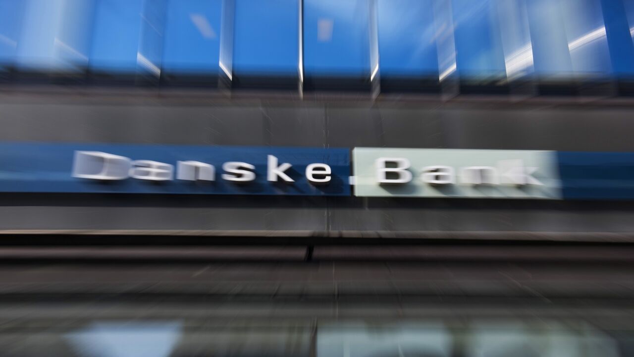 The logo of Danske Bank sits on display outside a bank branch in Copenhagen, Denmark, on Sept. 19, 2018.