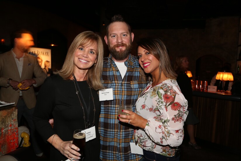 Debbie Crowder (EVP, Head of Branch Banking, SunTrust Banks), Nathan and Summer Deal