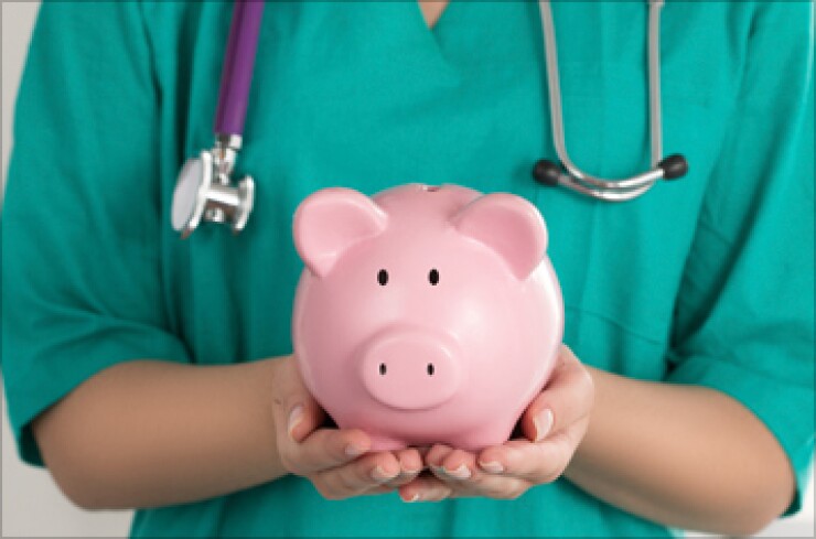 doctor-with-piggy-bank-istock-357.jpg