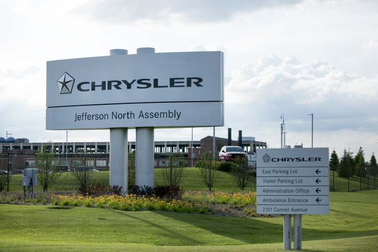 Fiat Chrysler Automobiles NV (FCA) signage stands outside of the company's Jefferson North Assembly plant in Detroit, Michigan, U.S., on Thursday, June 22, 2017.